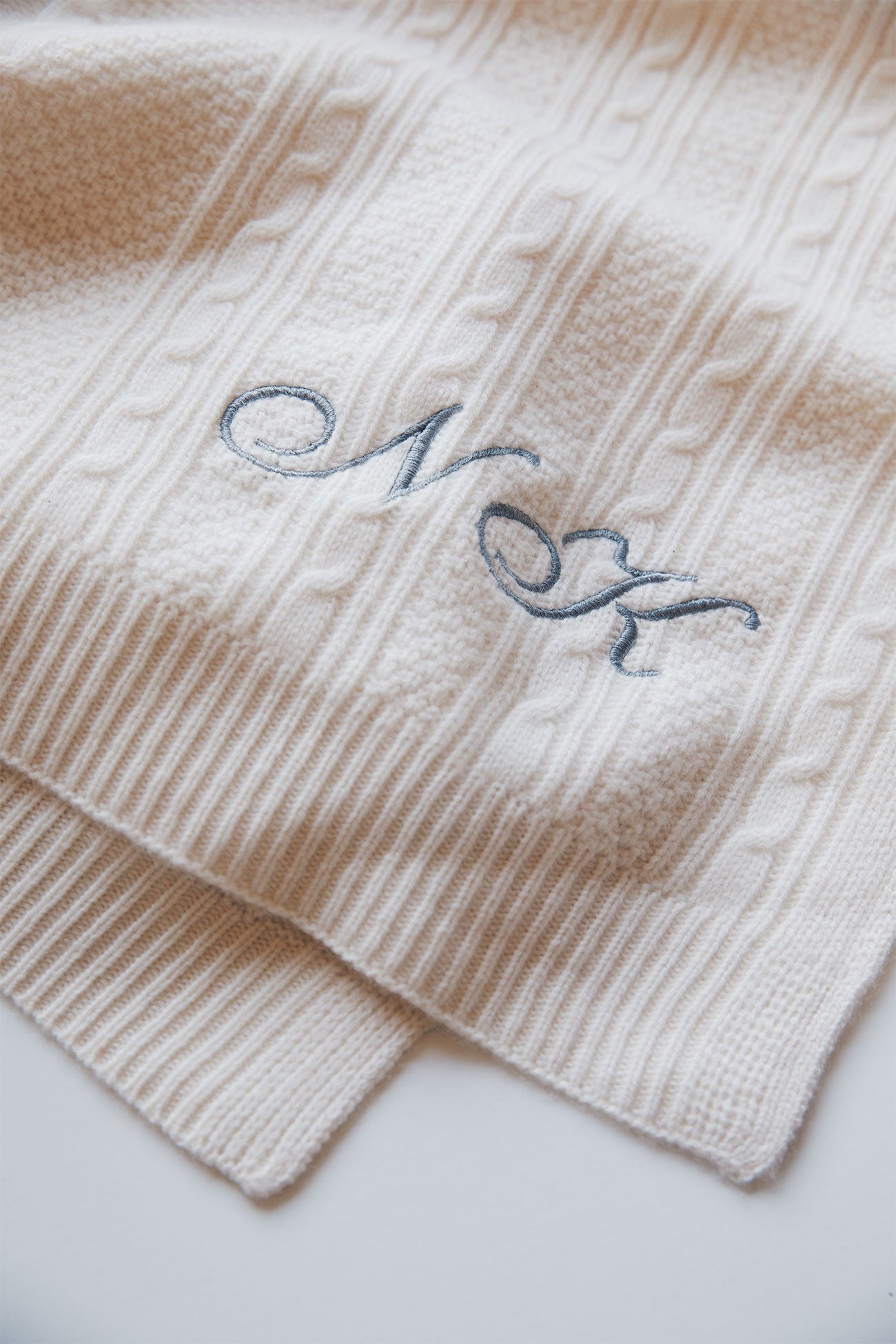 CABLE CASHMERE BABY BLANKET